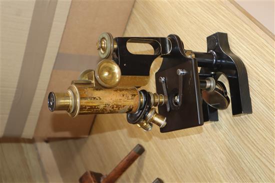 A Bausch & Lomb oak cased microscope